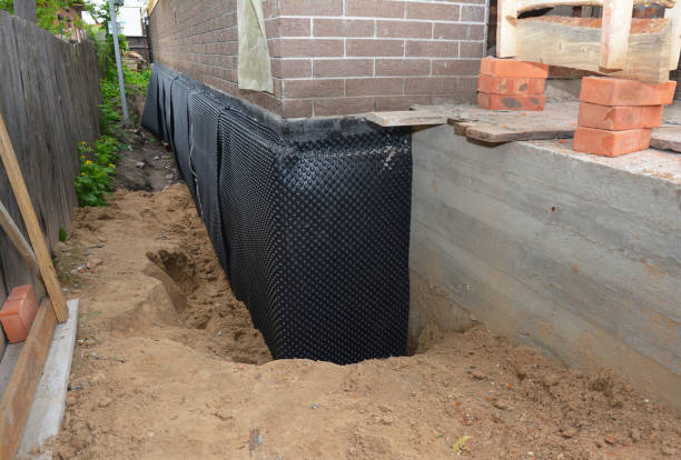 Happy homeowners after waterproofing job in New Plymouth